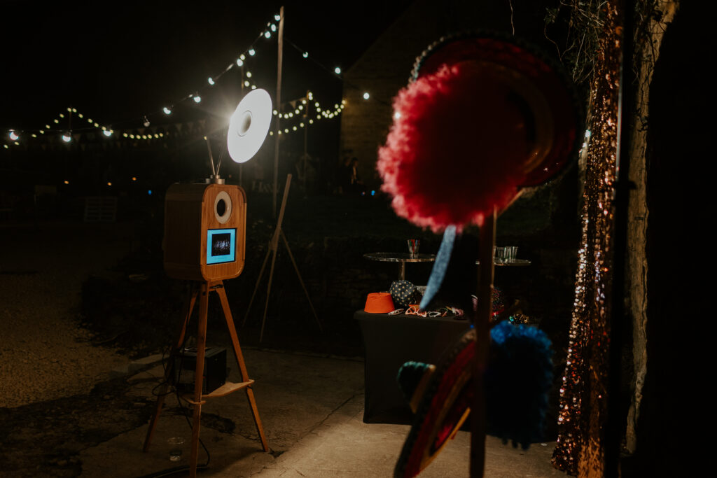 evening outdoor photo booth setup for a chipping campden private wedding