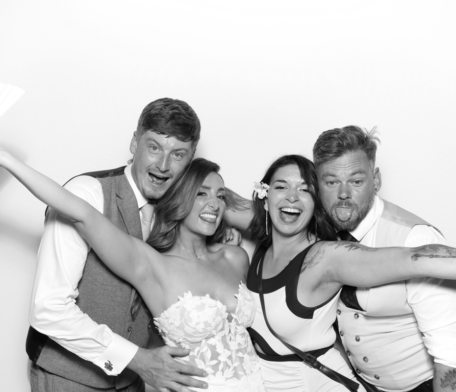 B&W kardashian style photo booth hire with bride and groom posing for  the best cirencester party entertainment rental
