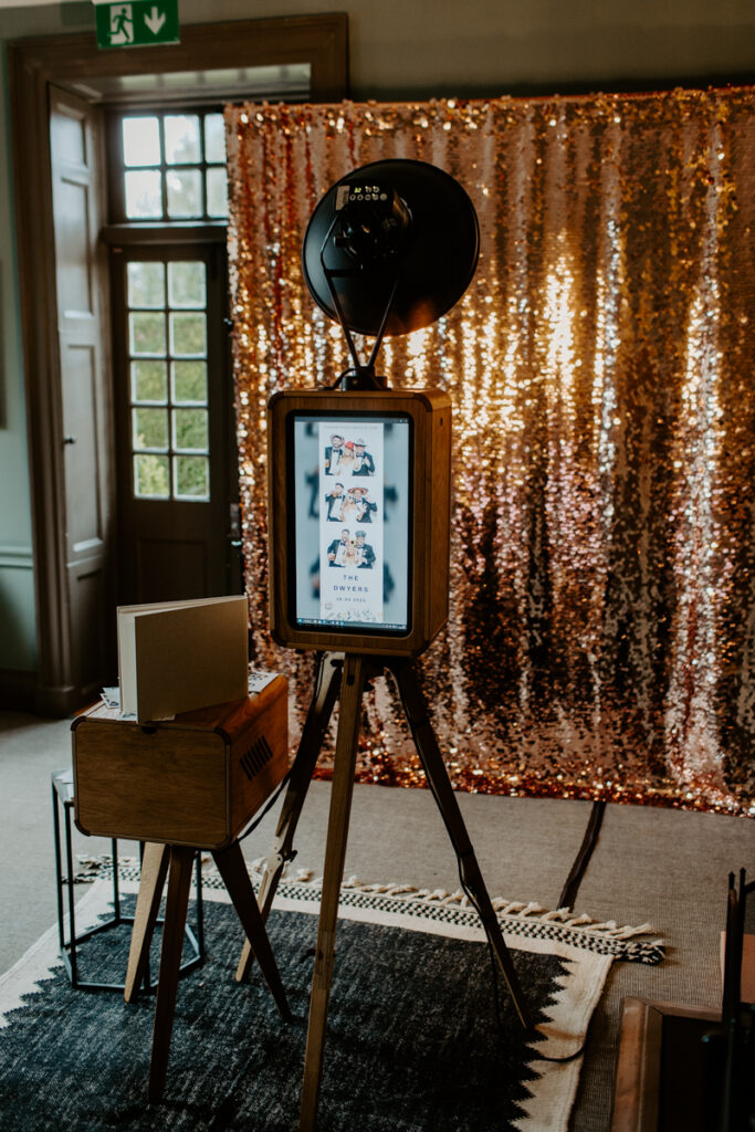 Icon premium photo booth Setup for The Painswick Hotel, Stroud with a champagne sequins backdrop
