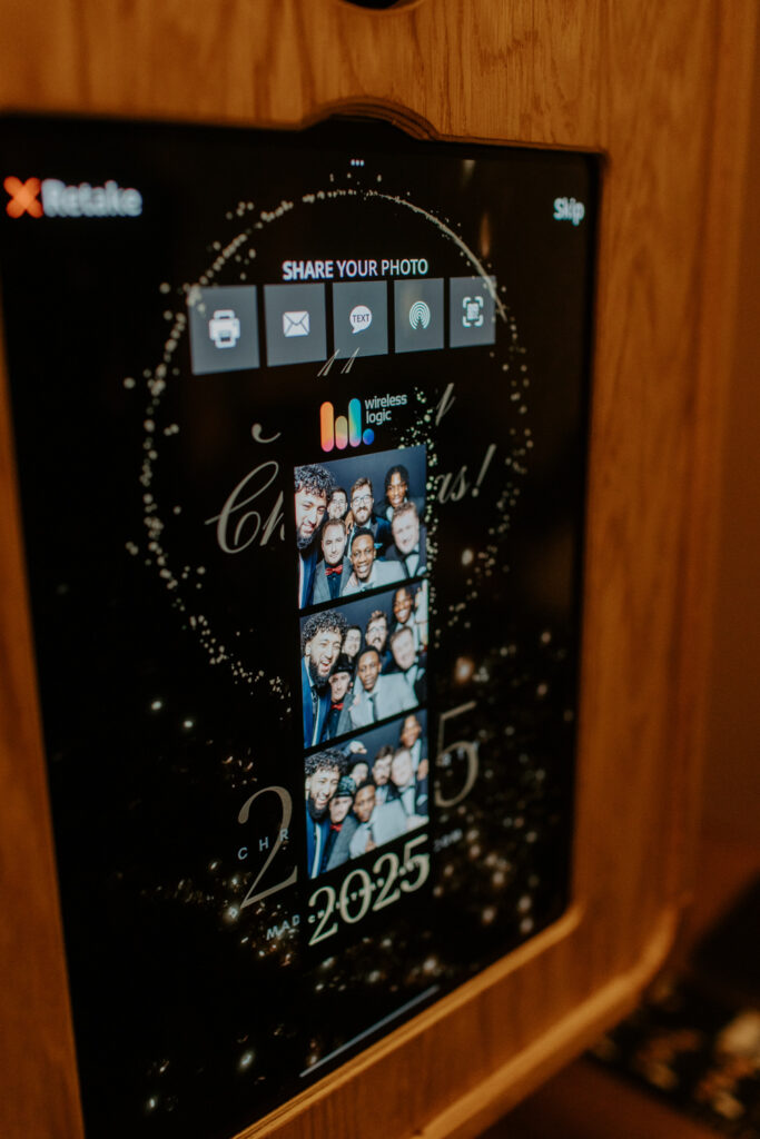 Front view of the Icon with prints samples display on the screen, set up for a festive company event at botleys mansion

