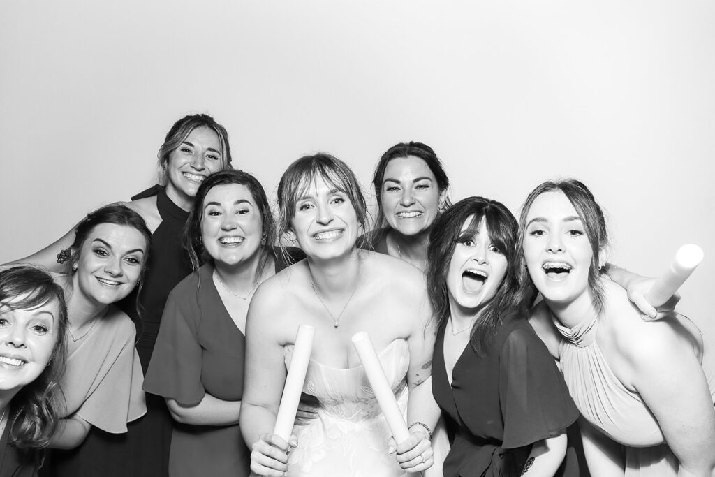 large group of ladies for a b&W kardashian glam photo booth rental at De Vere Tortworth Court Wedding