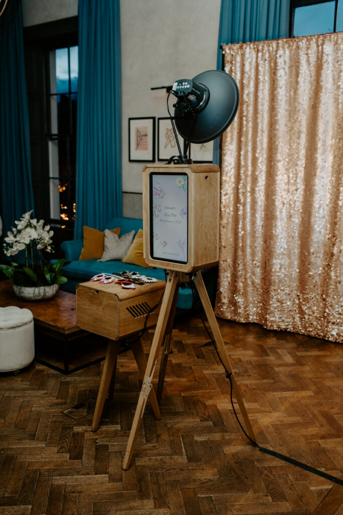beautiful photo booth setup with a premium photo booth hire and sequins backdrop, in cheltenham for an 18th birthday party at no131
