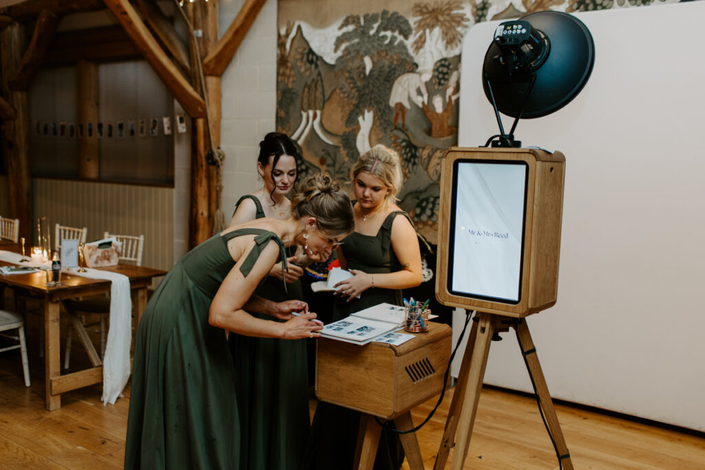 Photo booth prints from a Cotswold wedding at Owlpen Manor