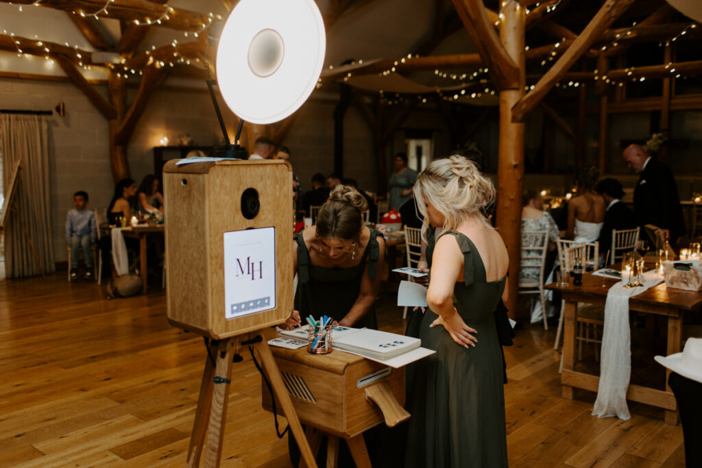 Photo booth moments from a real Owlpen Manor wedding