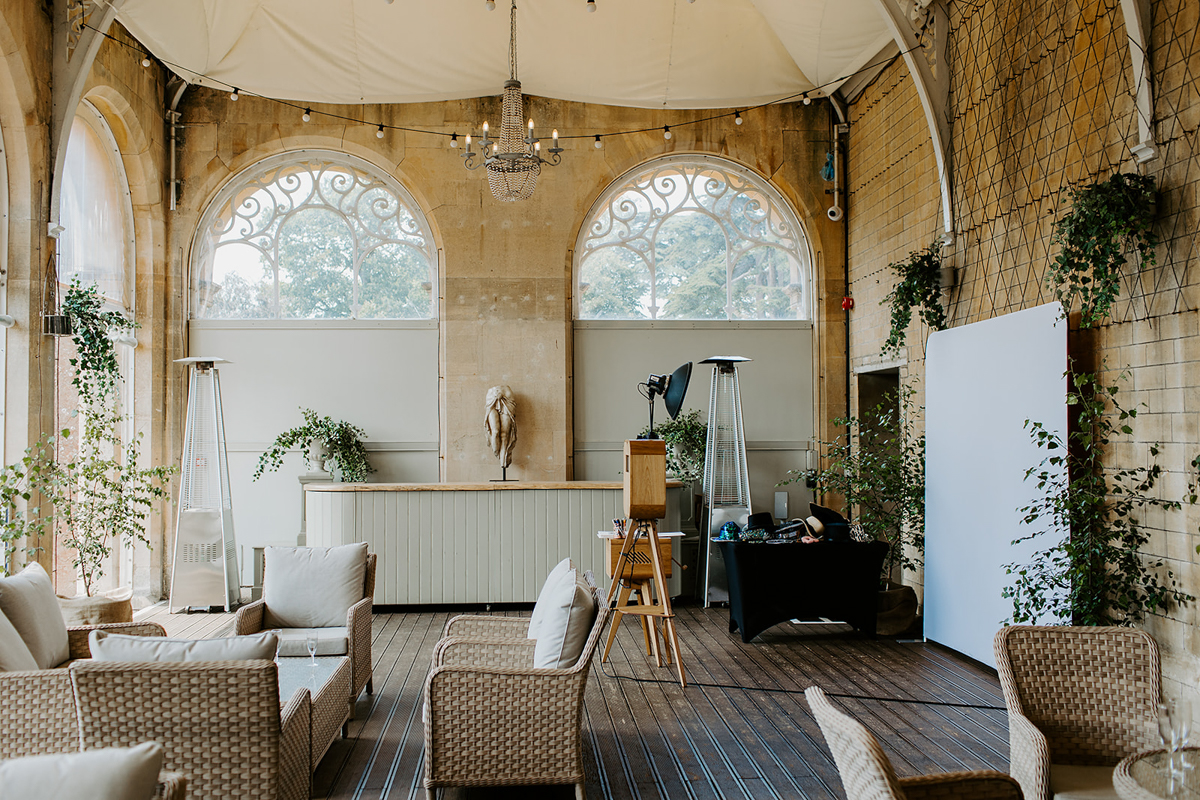 retro wooden photo booth hire at Grittleton House wedding venue in wiltshire for a wedding party entertainment