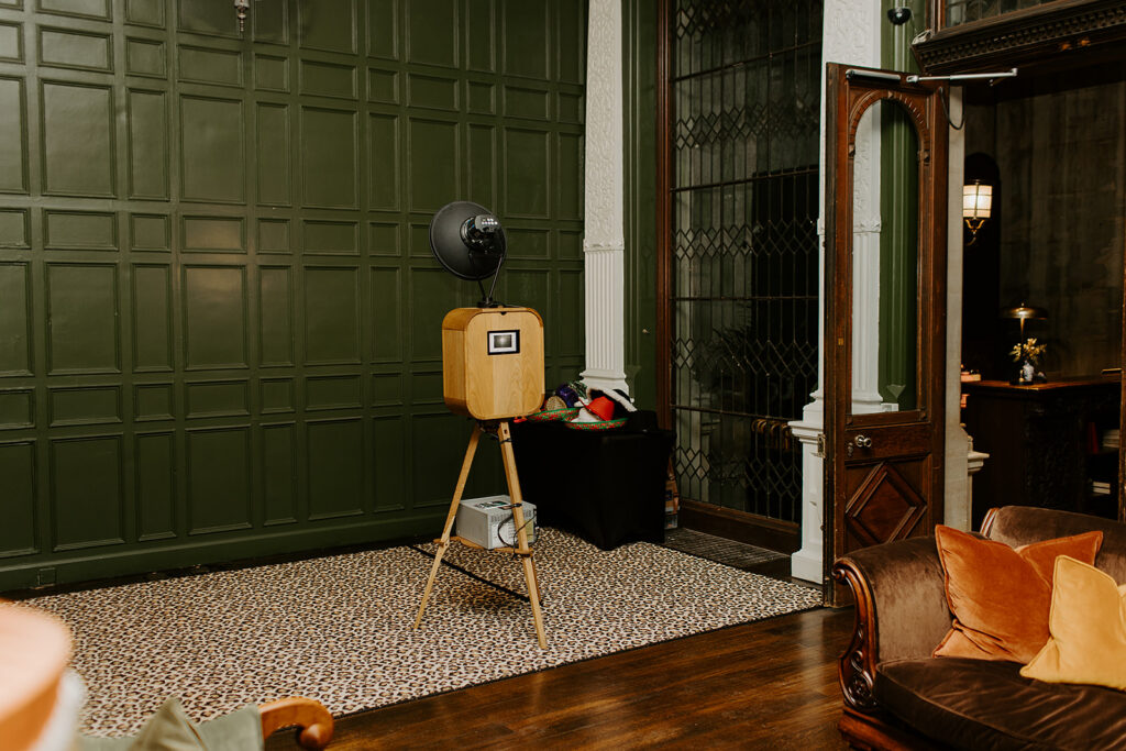 retro wooden photo booth at dumbleton hall
